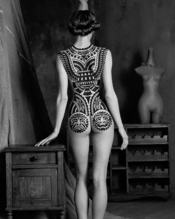 Bold blackwork tattoo by Ebie Tattooer - piece 9