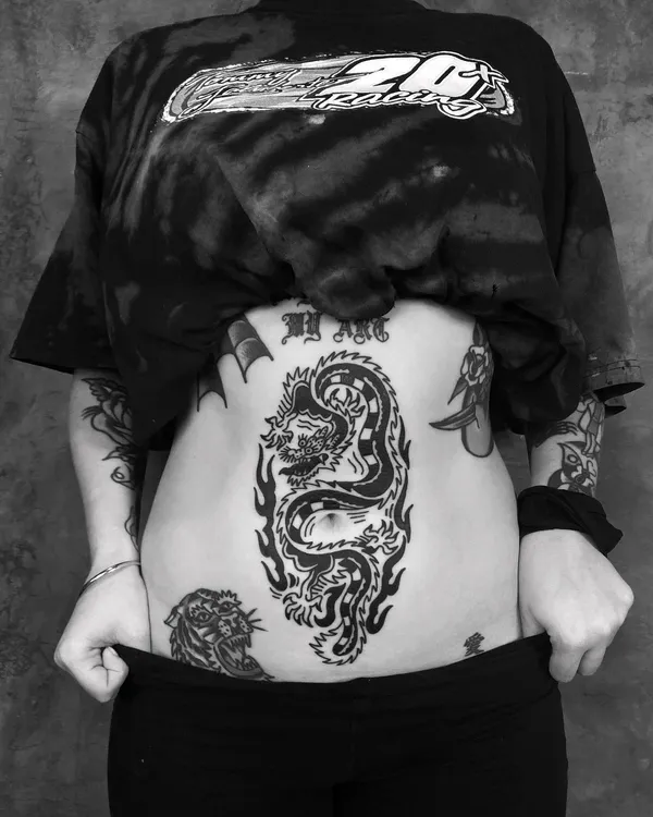 Bold blackwork tattoo by Ebie Tattooer - piece 8