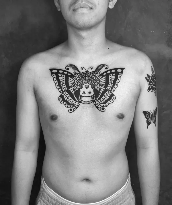 Bold blackwork tattoo by Ebie Tattooer - piece 7